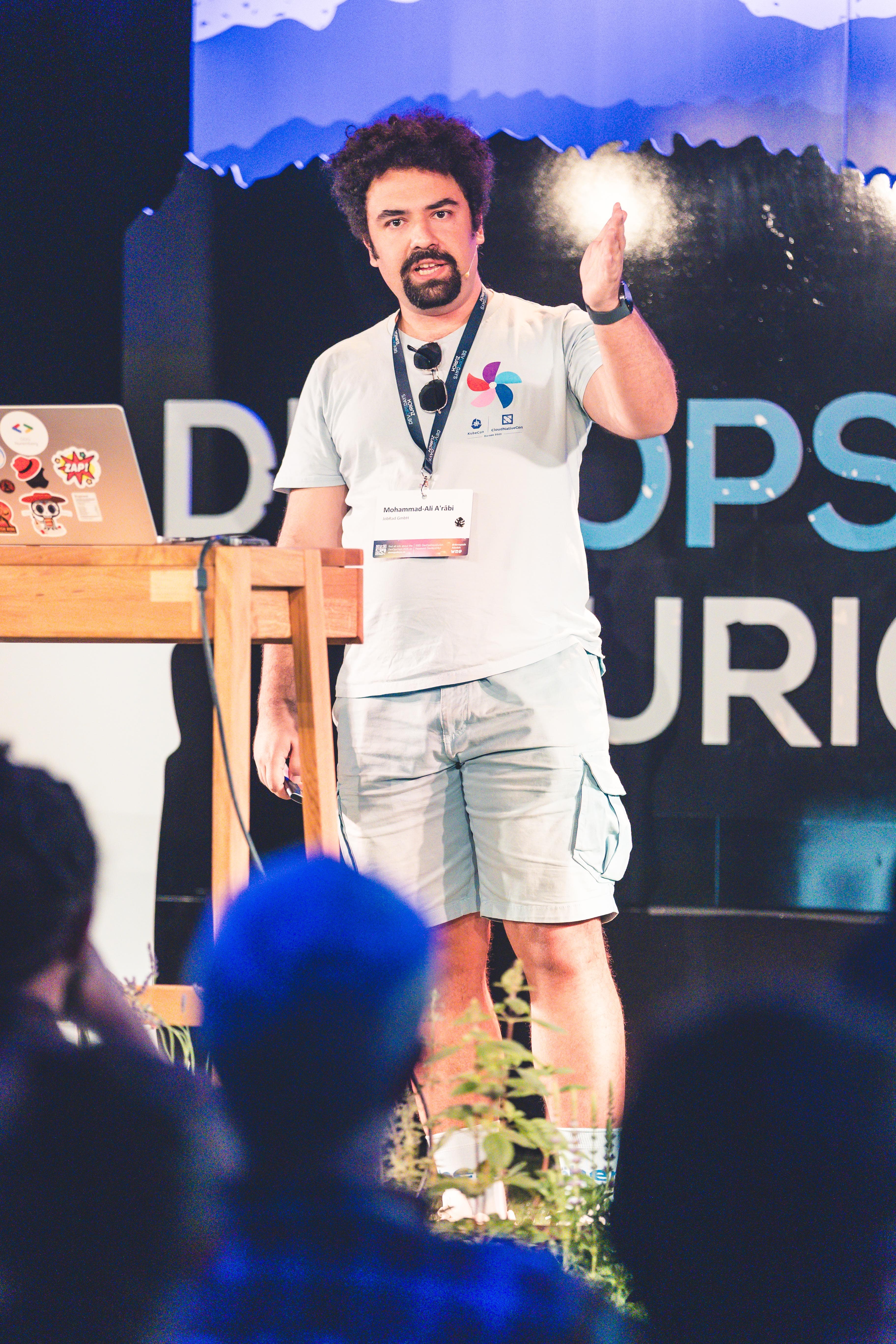 Stage view from the Beyond SBOMs talk at DevOpsDays Zurich 2026.